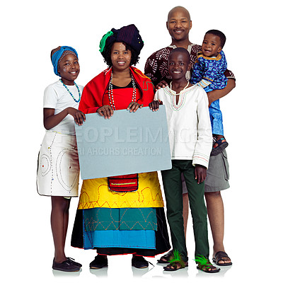 Buy stock photo Studio shot of a traditional african family holding a blank board, isolated on white