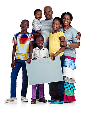 Buy stock photo African family, portrait and board sign or studio for culture, placard and hug on white background. Parents, children and empty display for mockup space, happiness and embrace for security on poster