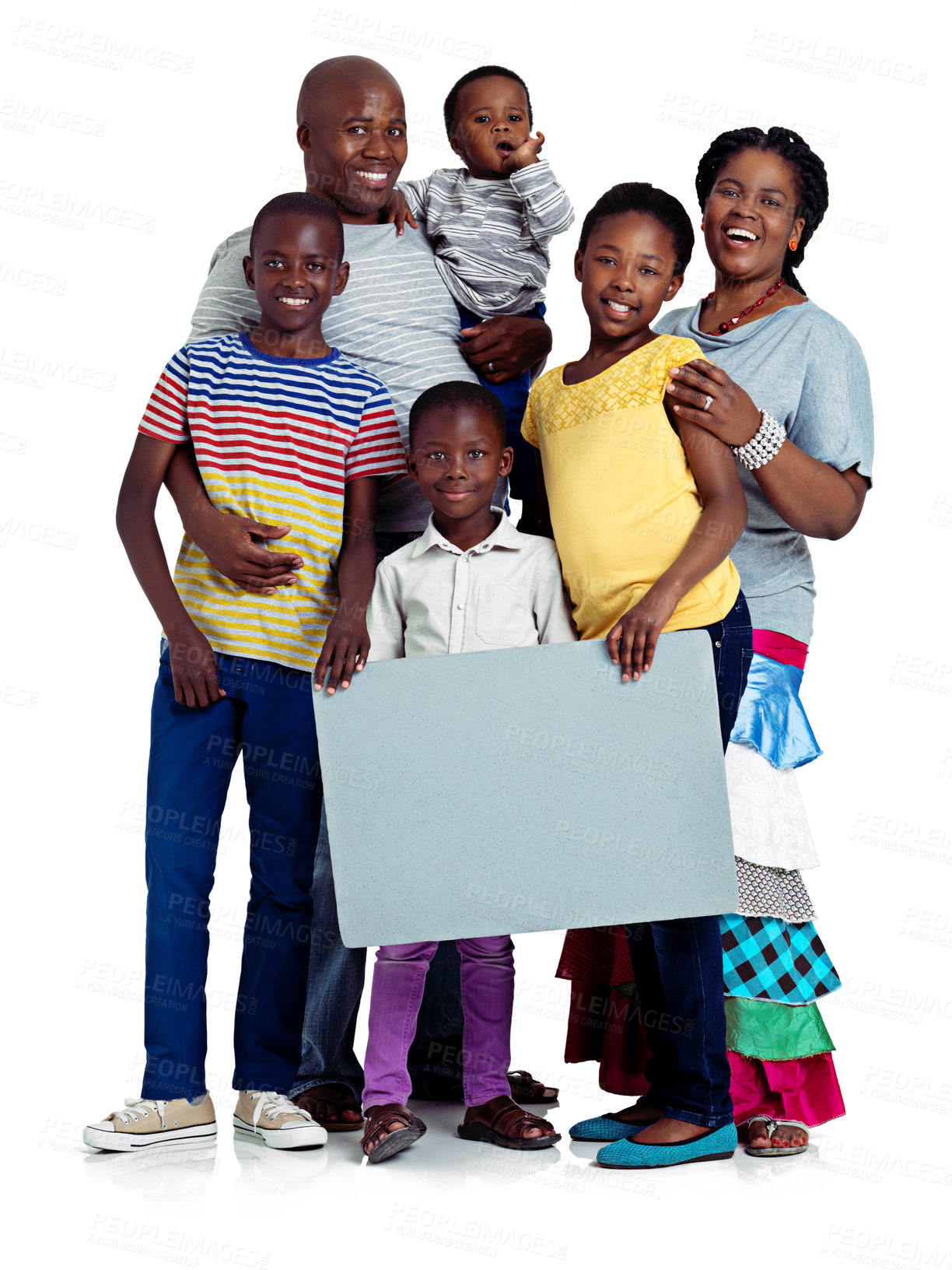 Buy stock photo Studio shot of a happy african family holding a blank board, isolated on white
