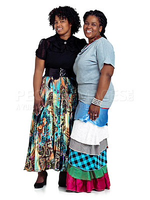 Buy stock photo Studio shot of two african women standing against a white background