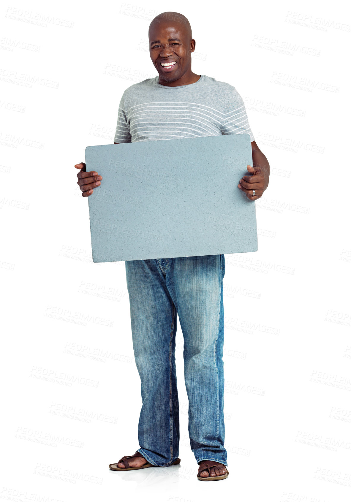Buy stock photo Studio shot of an african man holding up a blank board against a white background
