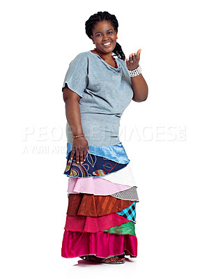 Buy stock photo Studio portrait of an african woman dressed in a traditional style skirt, isolated on white