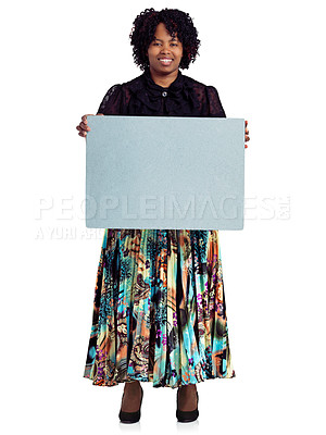 Buy stock photo Studio portrait of an african woman holding up a blank board against a white background