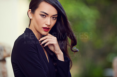 Buy stock photo Outdoor portrait of an elegant young woman in a feminine suit