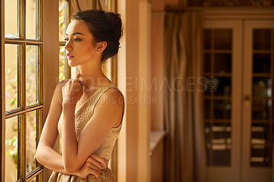 Buy stock photo Vintage fashion, thinking and woman by window in style, classy outfit and formal clothes in home. Wealth, aesthetic and person with confidence, pride and wondering in luxury manor, house and mansion