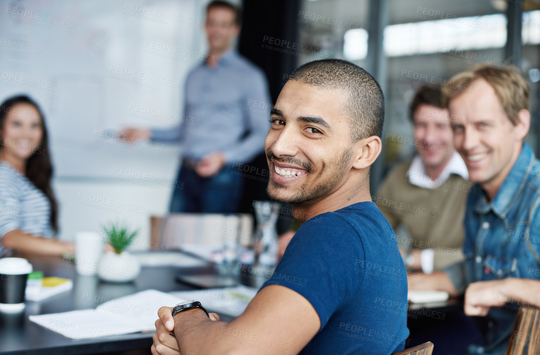 Buy stock photo Shot of a group of colleagues in a presentation in a boardroom