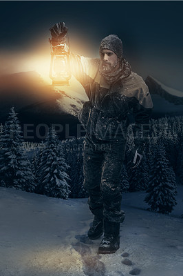 Buy stock photo Shot of a mountaineer using an oil lamp to search in the wilderness at night