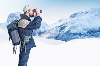 Buy stock photo Shot of a mountaineer using his binoculars to search the landscape
