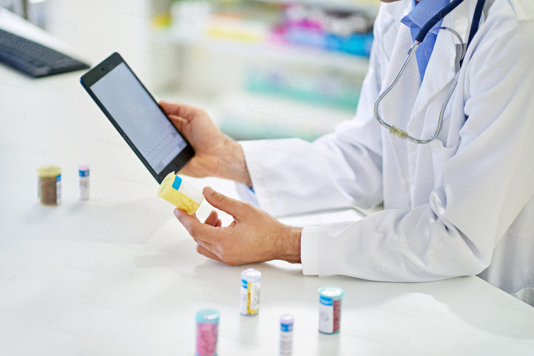 Buy stock photo Hands, pharmacist and digital tablet with pills, check or reading for telehealth with prescription. Person, touchscreen and bottle for drugs, medicine or pharmaceutical product with app for inventory