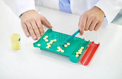 Buy stock photo Hands, pharmacist and counting pills with container, inspection and prescription for healthcare. Person, drugs and medicine with plastic bottle, pharmaceutical product and supplements for wellness