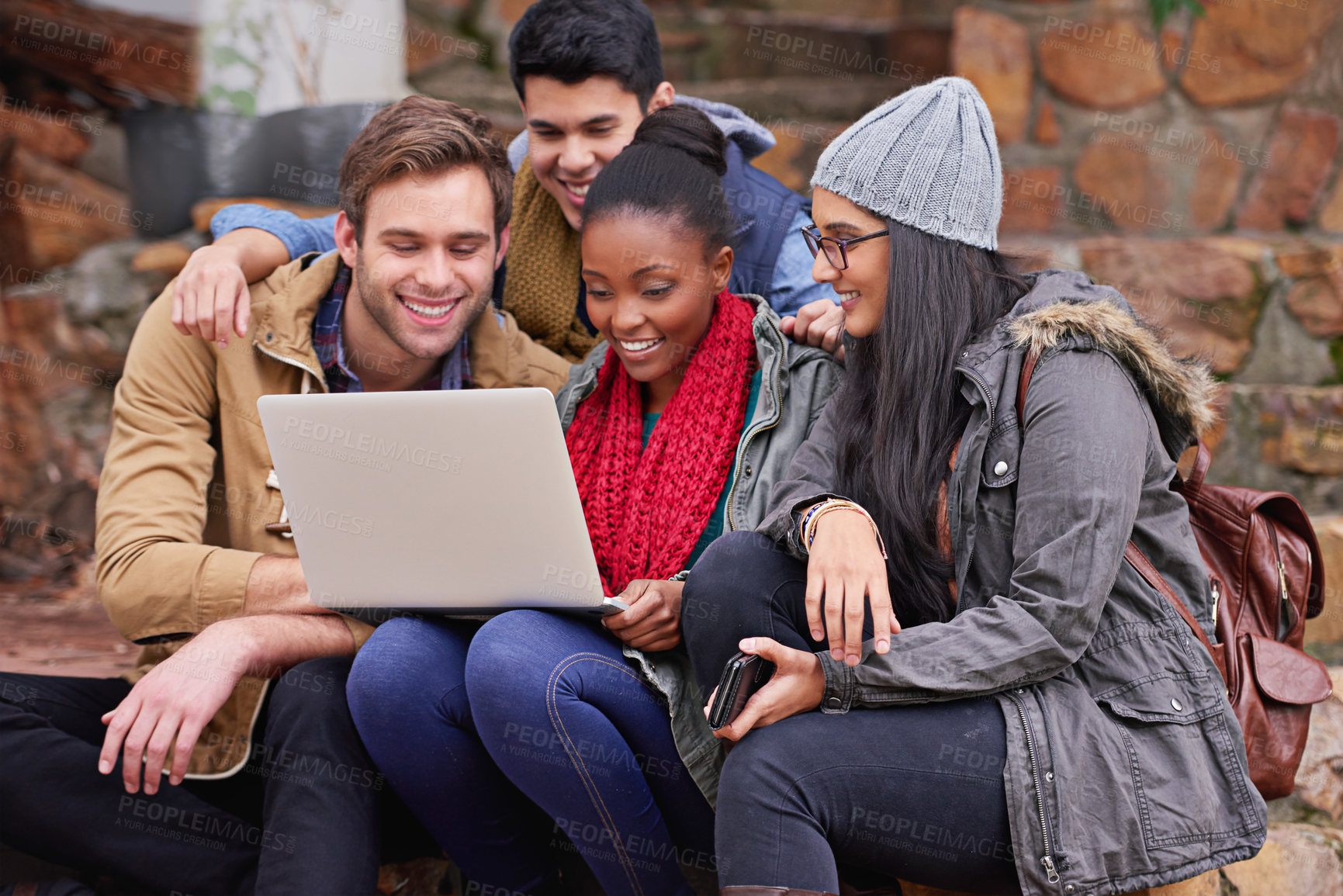 Buy stock photo University, talking and friends with laptop on campus for communication, learning or knowledge. Diversity, education and students with technology for assignment, study group or search internet