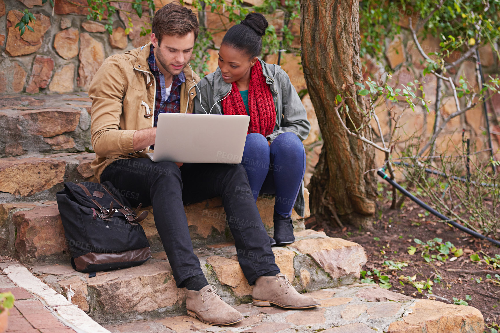 Buy stock photo University, laptop and friends on campus steps for learning, research or planning exam study notes. Education, college and gen z students with computer, search or sign up for elearning virtual tutor