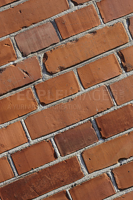 Buy stock photo Brick wall, wallpaper and closeup of cement for texture, concrete pattern or masonry in architecture. Red stone, background and rough design for building with material, exterior and cracked structure