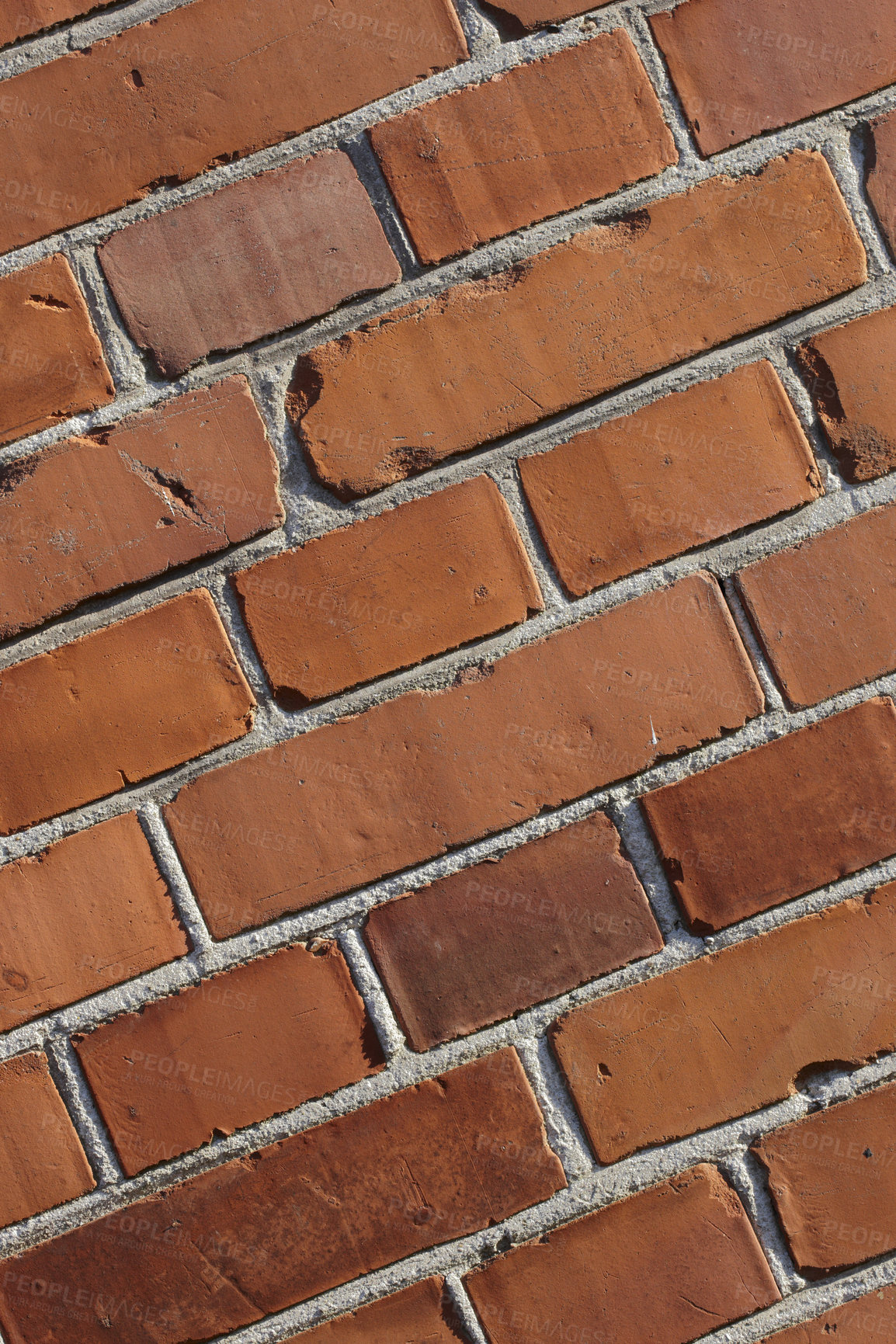 Buy stock photo Brick wall, wallpaper and closeup of cement for texture, concrete pattern or masonry in architecture. Red stone, background and rough design for building with material, exterior and cracked structure