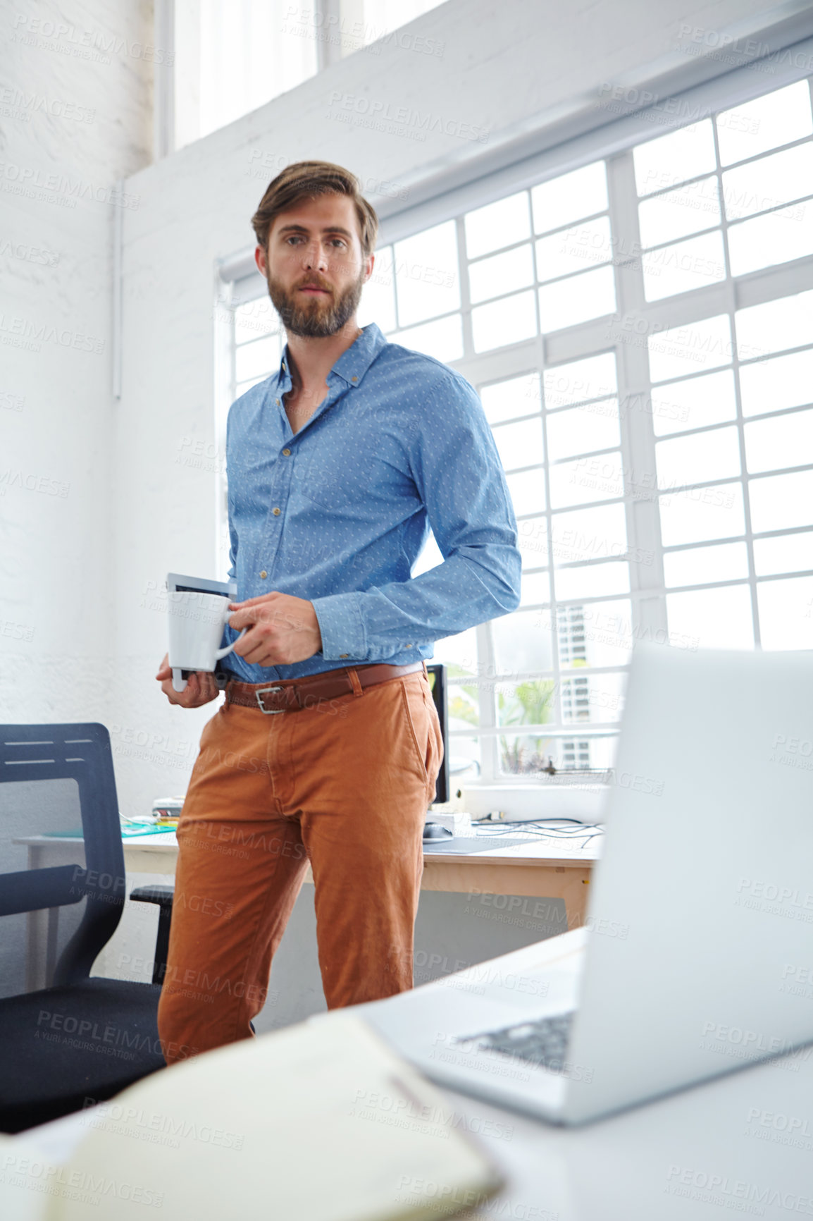 Buy stock photo Portrait of a handsome male designer in his office