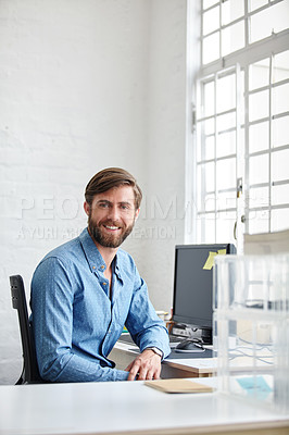 Buy stock photo Shot of a handsome designer smiling at the camera