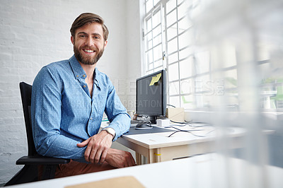 Buy stock photo Shot of a handsome designer smiling at the camera