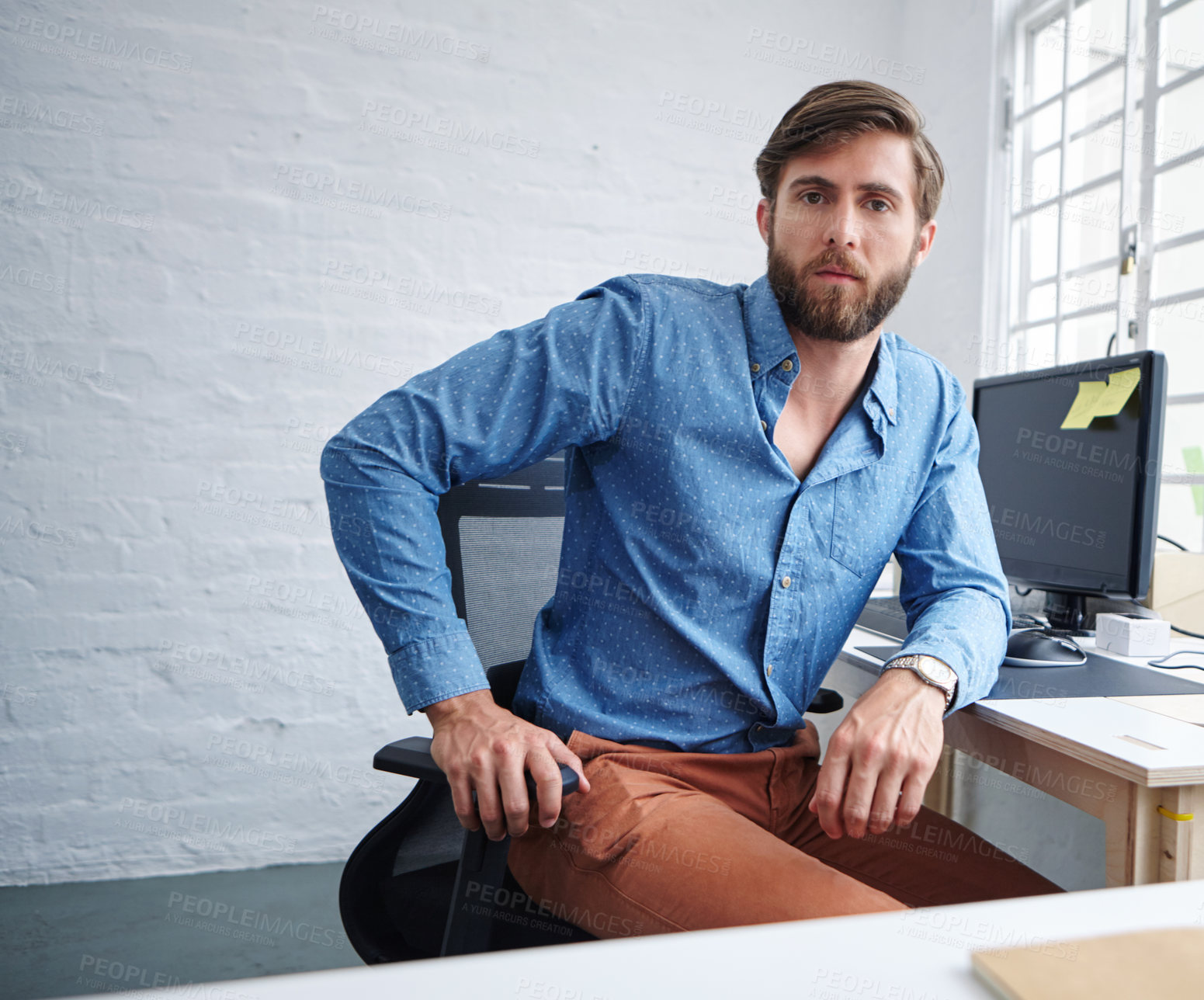 Buy stock photo Portrait of a serious designer in his office