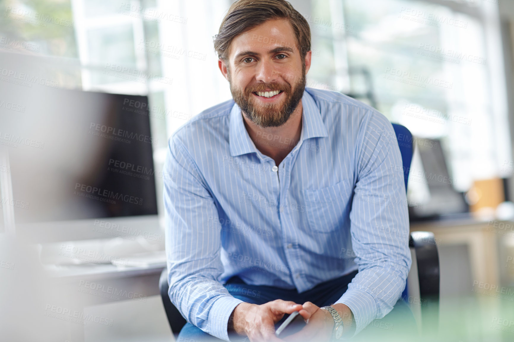 Buy stock photo Shot of a handsome designer smiling at the camera