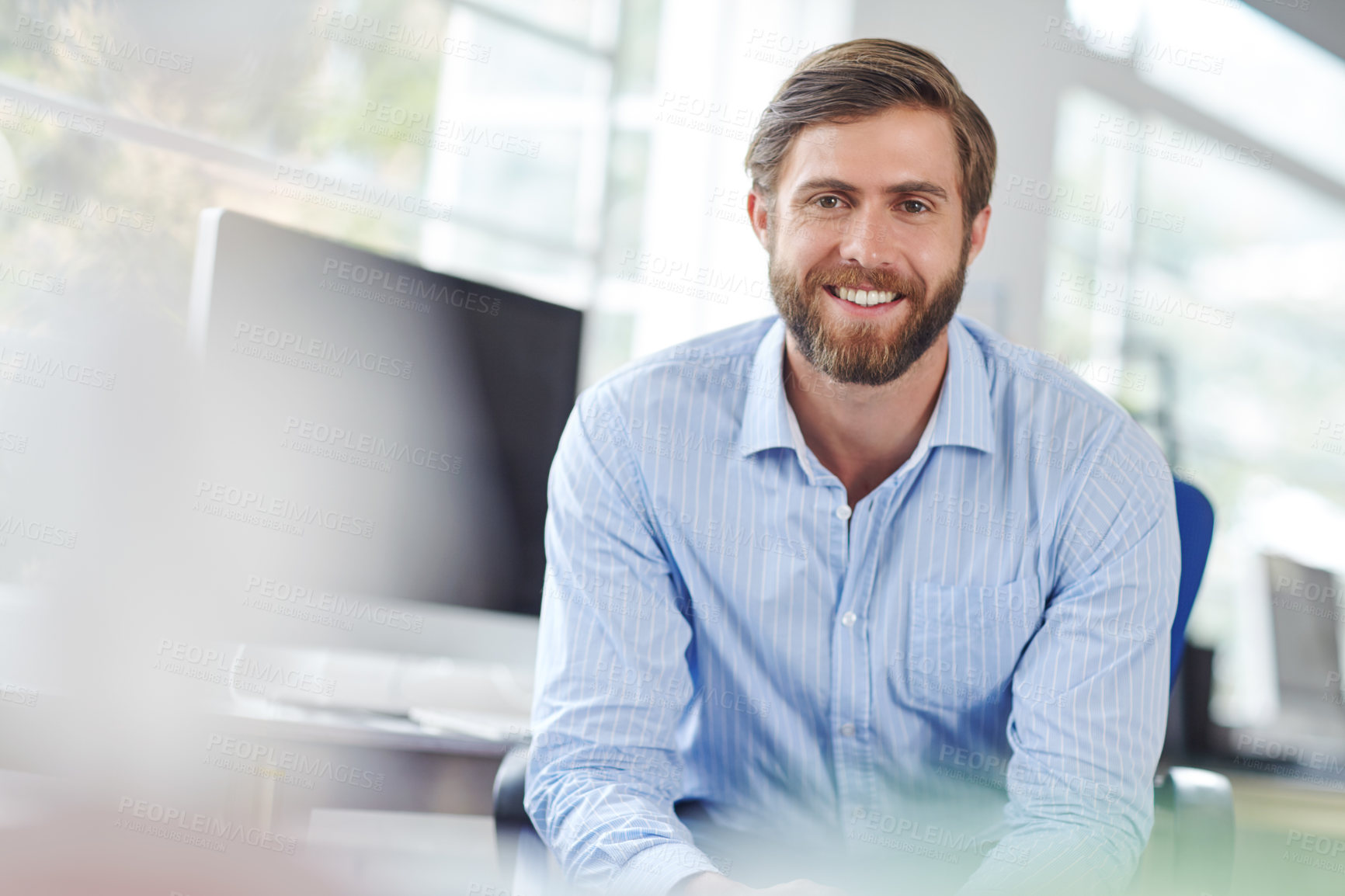 Buy stock photo Shot of a handsome designer smiling at the camera