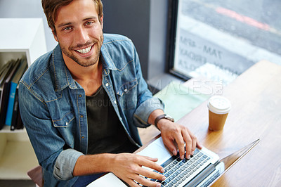 Buy stock photo Man, laptop and freelance portrait in cafe, above and typing article for internet blog in bistro. Coffee cup, restaurant and person online for remote work, copywriting story and freelancer at diner