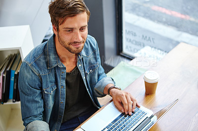 Buy stock photo Cafe, thinking and man with laptop for freelancer, information and smile for news story for publication. Coffee shop, male person and editor with digital blog for remote work, editing ideas and above