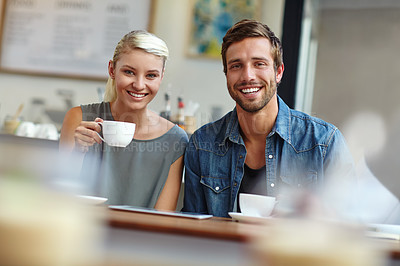 Buy stock photo Portrait of a young couple on a date at a coffee shop