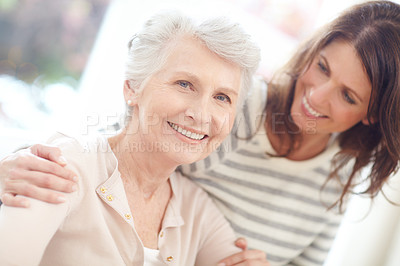 Buy stock photo Portrait of a loving mother and daughter spending time together at home