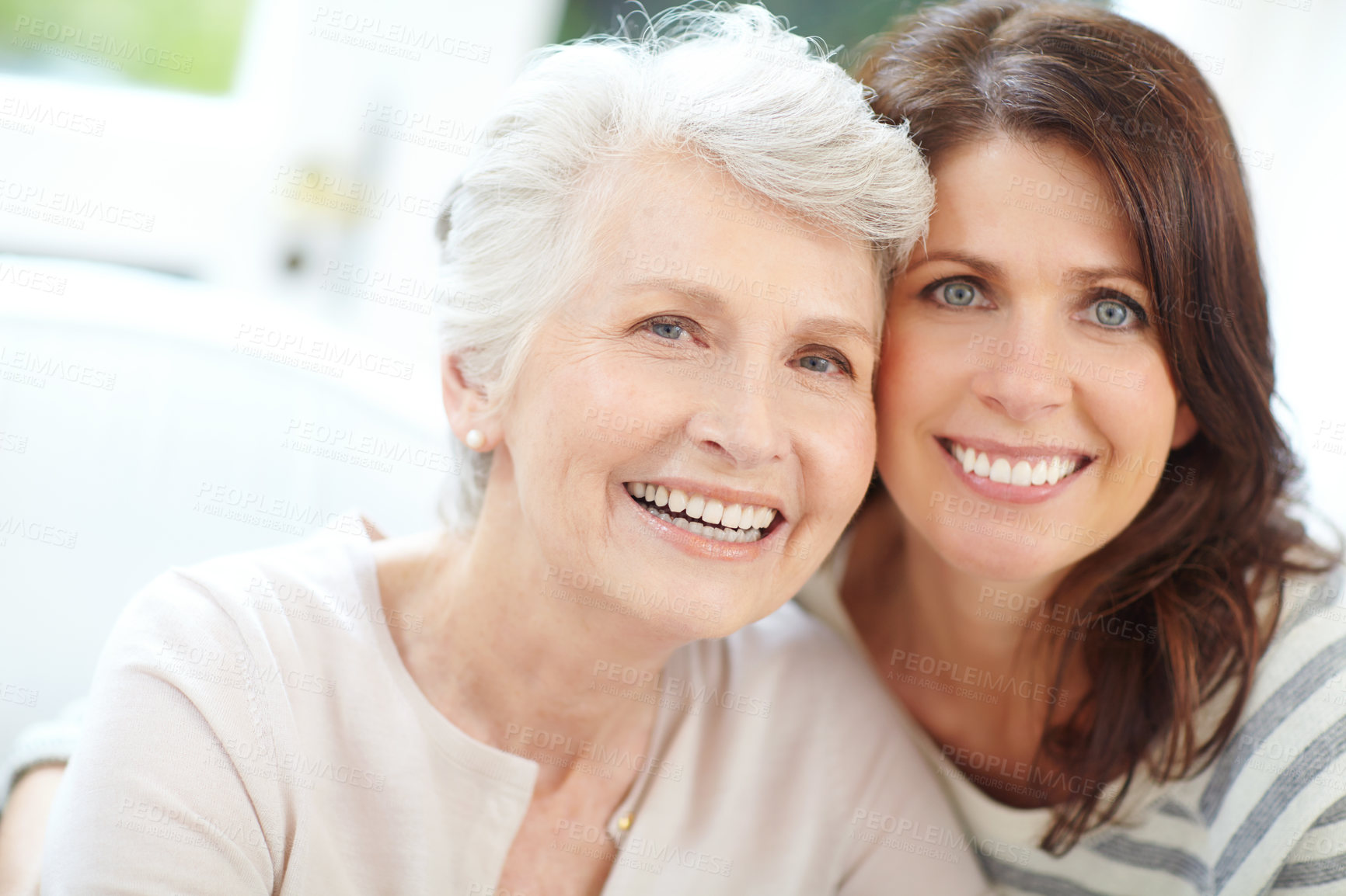 Buy stock photo Portrait of a loving mother and daughter spending time together at home