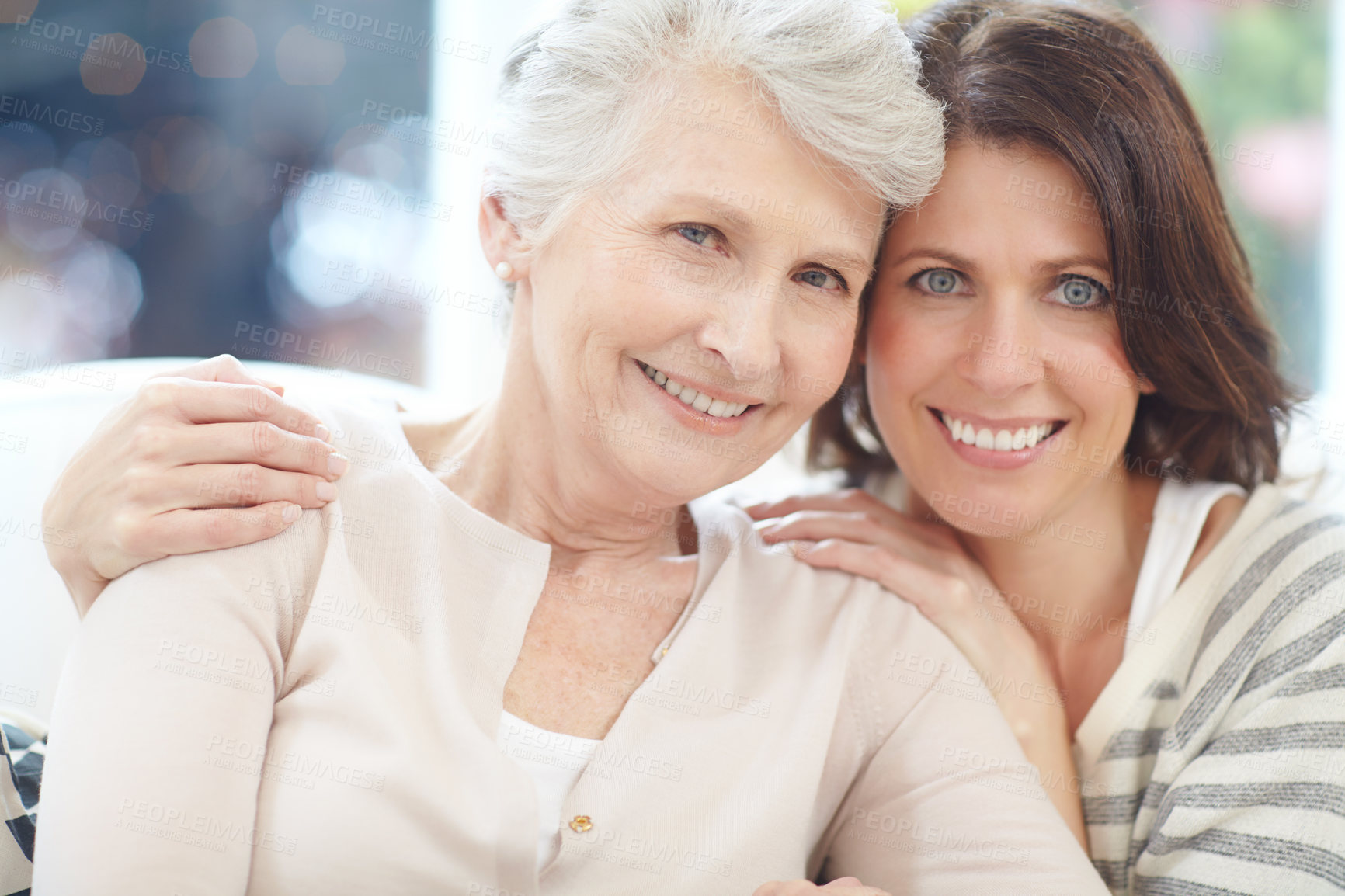 Buy stock photo Portrait, happy and senior woman with daughter in home for love, affection and bonding together. People, bokeh and embrace with old mother for family visit, parent support and relationship connection