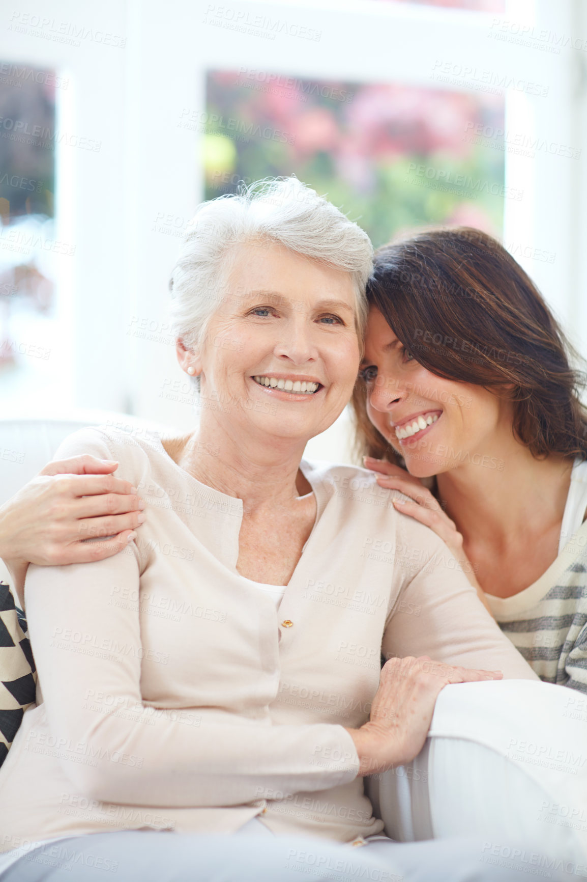 Buy stock photo Portrait of a loving mother and daughter spending time together at home