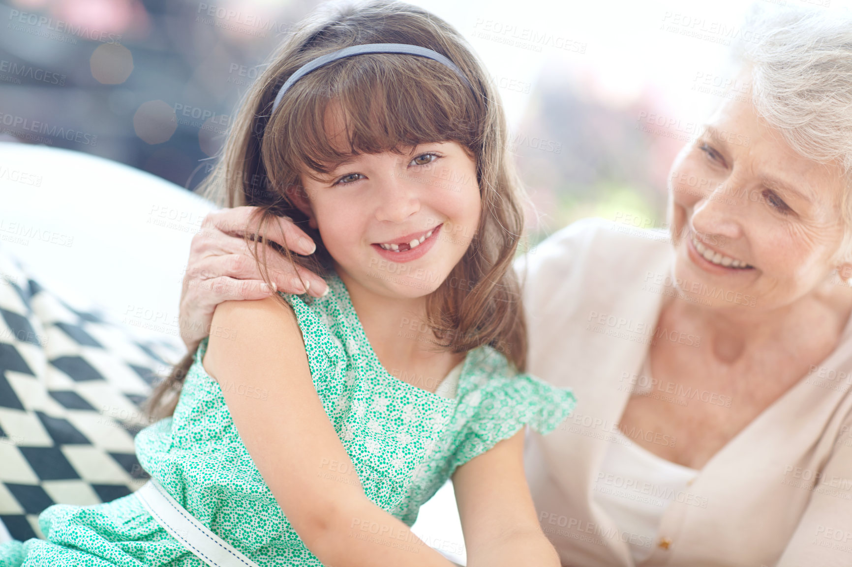 Buy stock photo Portrait of a loving grandmother and granddaughter spending time together at home