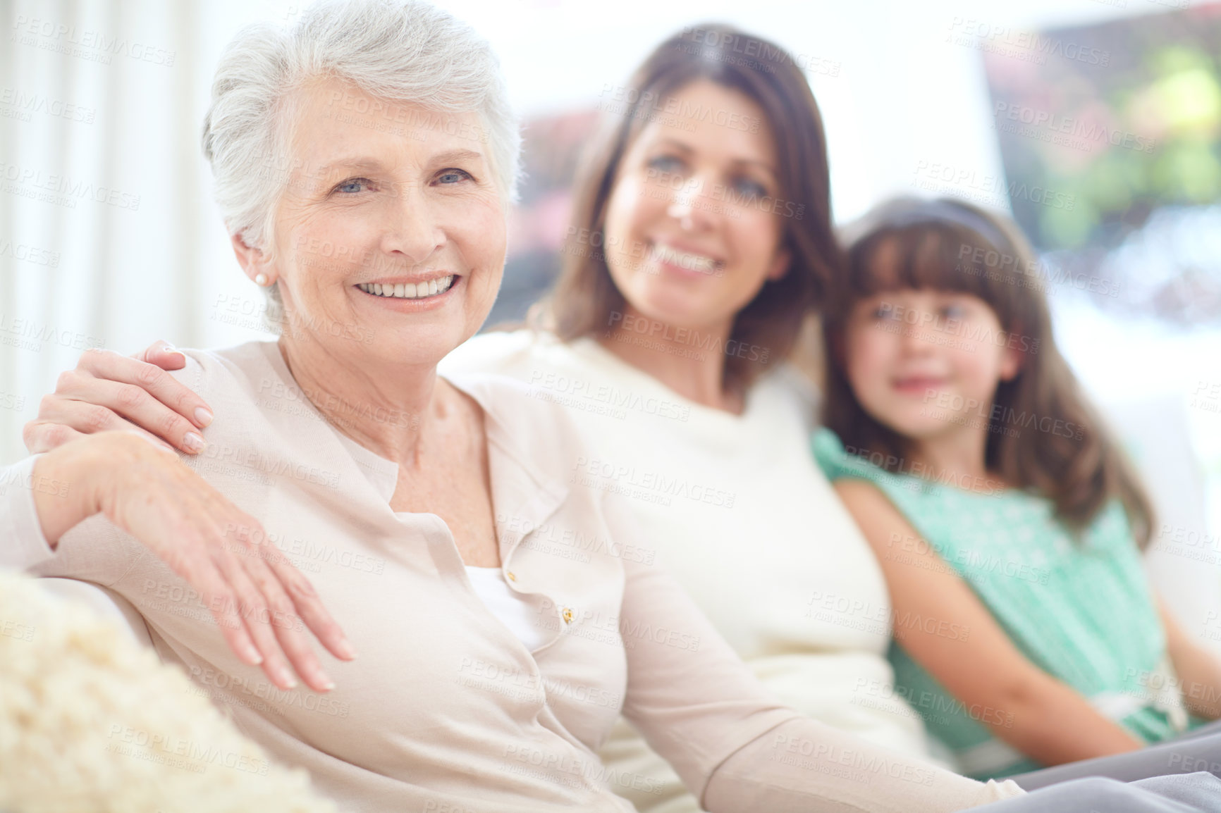 Buy stock photo Love, relax and senior woman with family on sofa in living room for bonding together at home. Smile, rest and elderly female person with daughter and grandchild for generations connection at house.