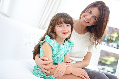 Buy stock photo Portrait of a cute little girl spending time with her mother at home