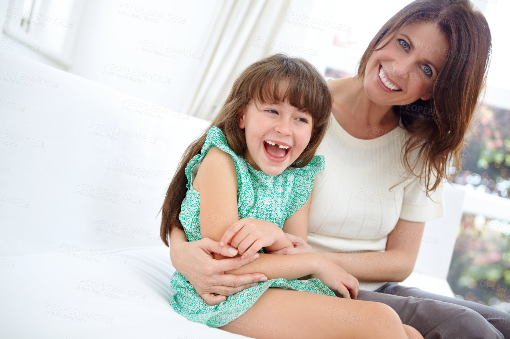 Buy stock photo Portrait of a cute little girl spending time with her mother at home