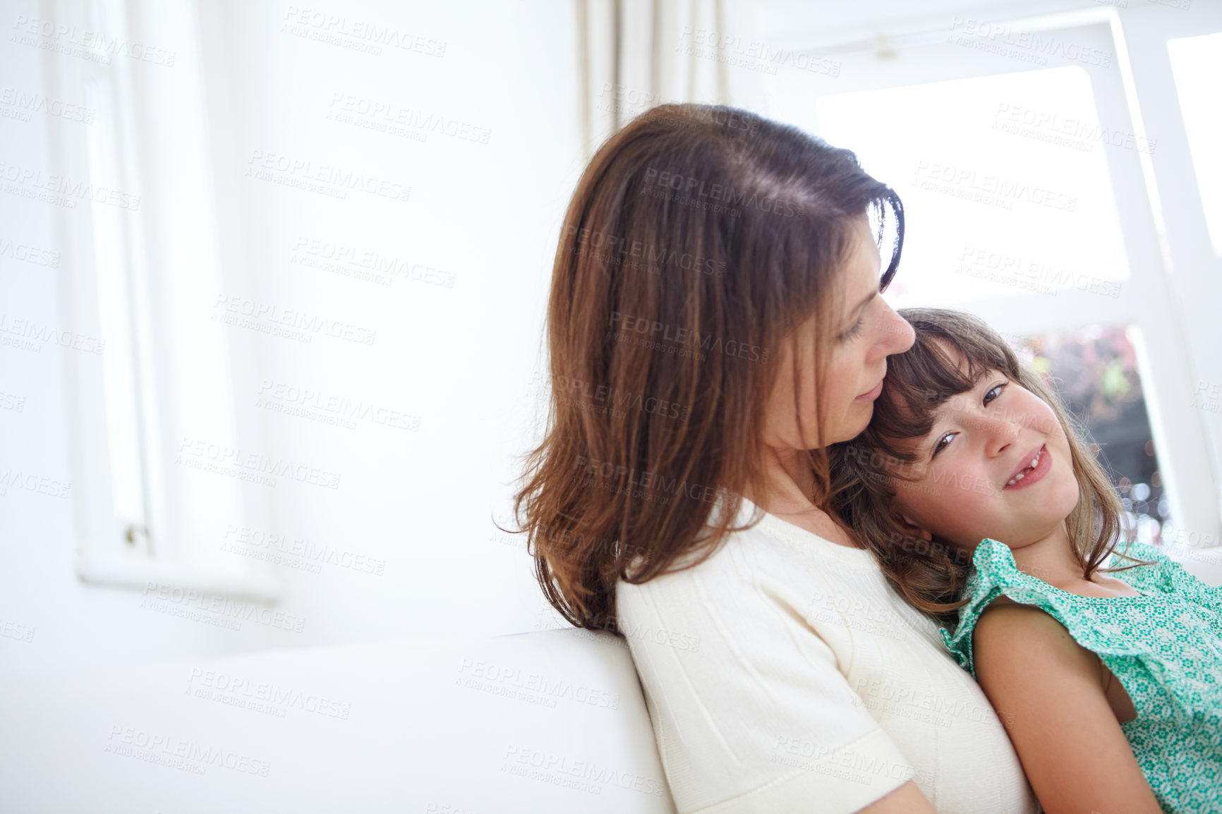 Buy stock photo Portrait of a cute little girl spending time with her mother at home