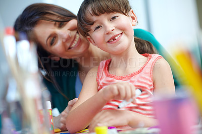 Buy stock photo Shot of a mother and daughter having fun being creative