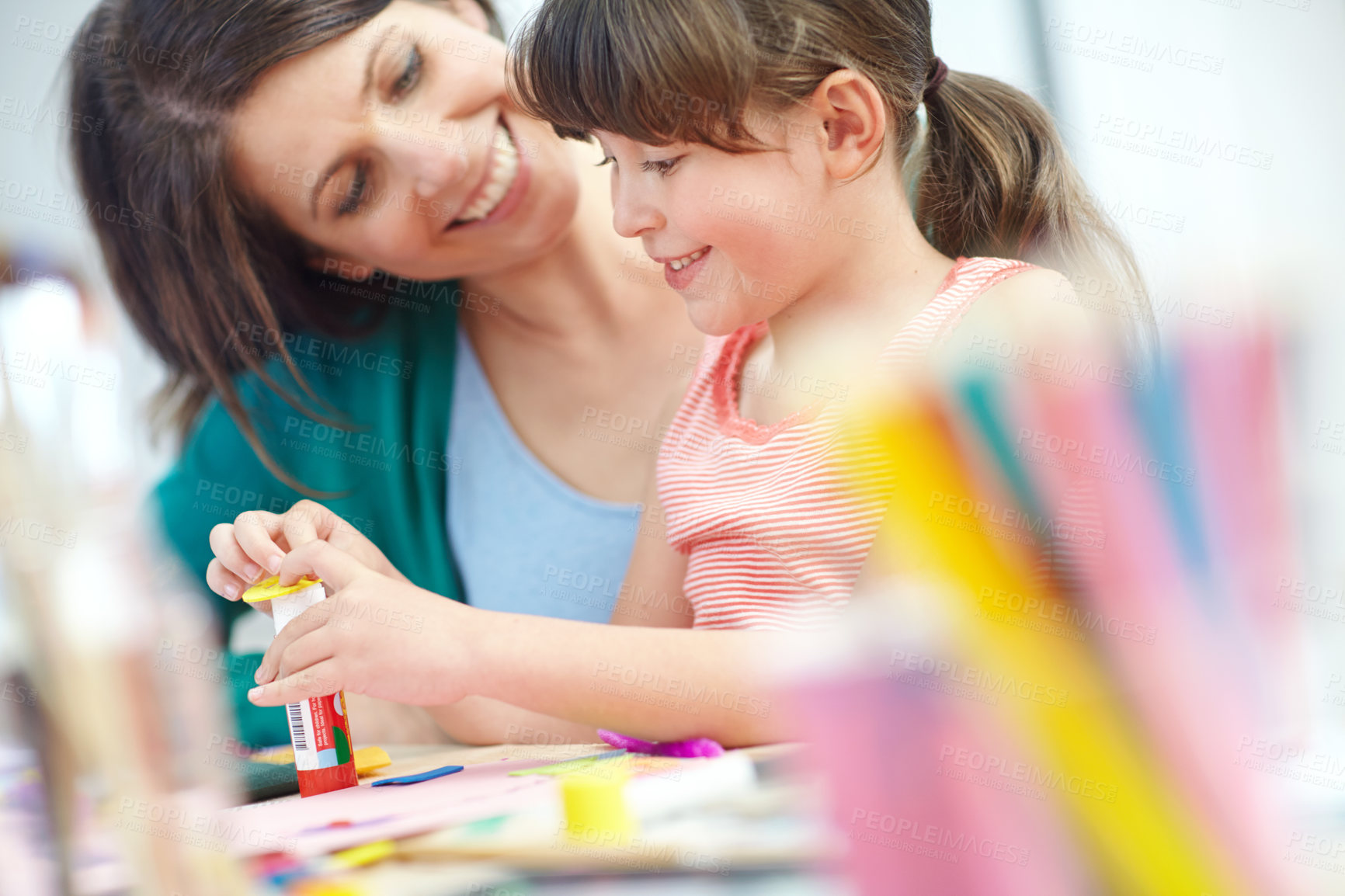 Buy stock photo Shot of a mother and daughter having fun being creative