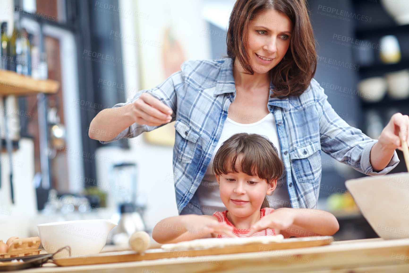 Buy stock photo Kitchen, mom and girl with smile, baking and learning with flour, prepare ingredients and happiness. Woman, home and child with teaching, love and skill development with recipe and dessert help