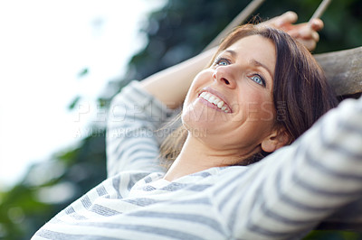Buy stock photo Shot of a beautiful woman enjoying the outdoors
