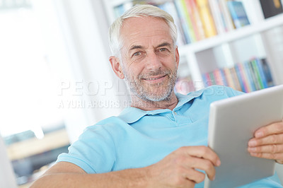 Buy stock photo Tablet, portrait or relax senior man doing internet, web or online website search while happy in home living room. Online shopping, digital tech or elderly person typing, check or scroll on ui screen