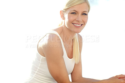 Buy stock photo Portrait of a beautiful blonde woman relaxing in the sunlight