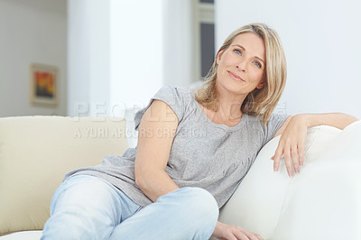 Buy stock photo Relax, portrait and woman on a sofa in the living room for rest, relaxing and chilling at home. Comfort, calm and mature female with positive mindset from Australia sitting on the couch in her house.