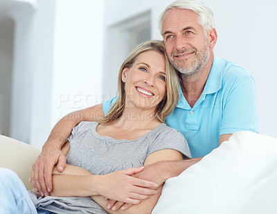 Buy stock photo Senior couple, portrait and love in their home while happy about retirement, love and support. Commitment of a man and woman in a healthy marriage with trust, care and security on a living room couch