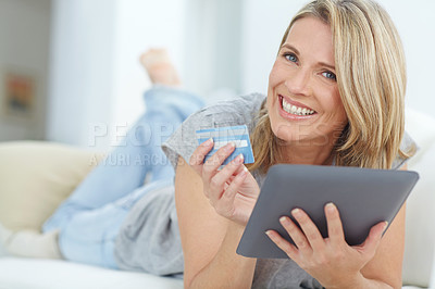 Buy stock photo Mature woman, portrait or credit card on tablet banking, financial management or investment security in living room. Smile, happy or relax person on digital technology in house insurance or home loan