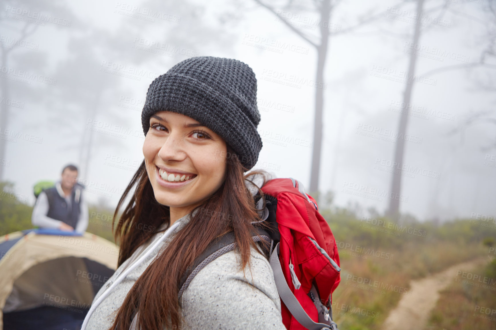 Buy stock photo Portrait of an attractive young woman on a hiking trip with her boyfriend