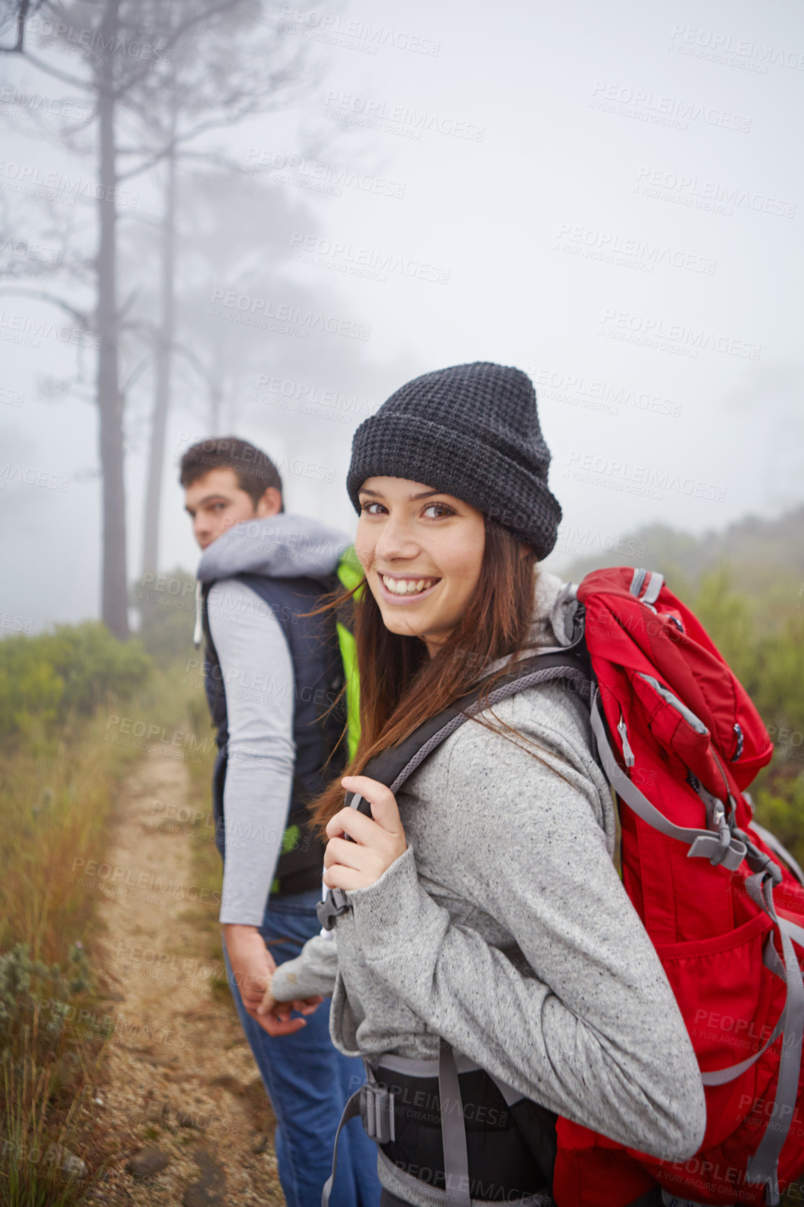 Buy stock photo Portrait of a beautiful young woman out hiking with her boyfriend