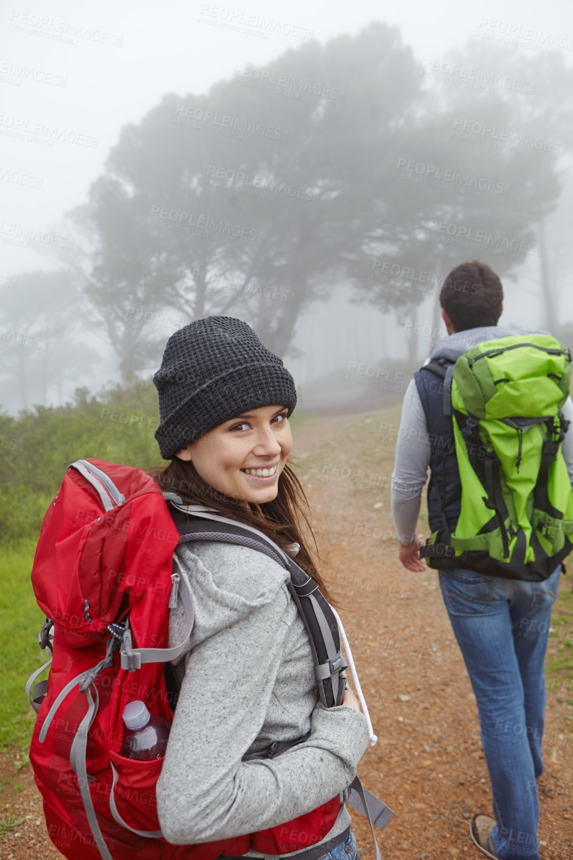 Buy stock photo Hiking, smile and walking with couple in nature for tourism, trekking holiday and explore. Love, wilderness adventure and backpacking vacation with man and woman outdoor for support and date