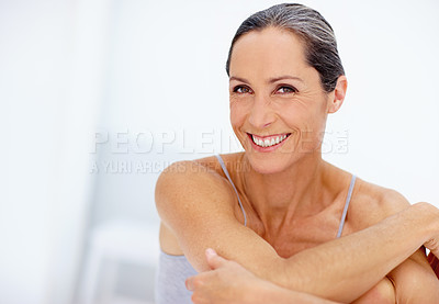 Buy stock photo Cropped portrait of a beautiful mature woman posing in studio