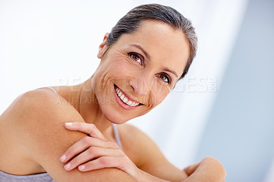 Buy stock photo Cropped portrait of a beautiful mature woman posing in studio